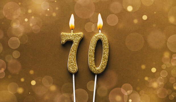 Number 70 seventy candle on bokeh background
