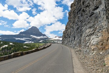 Scenic road-side view of Glacier National Park rocks on a sunny day