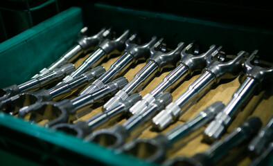 Fototapeta premium The workpiece is in process. Industrial material. Raw material waits for supply to the machining process