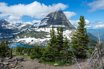 Scenic view of the lake and mountains in Glacier National Park on a sunny day