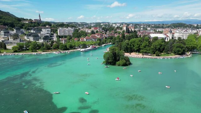 Lake Annecy, France - Pedal Boats, Turquoise Light Blue Lake and Old Town Cityscape - Aerial