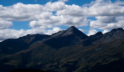 Cloudy blue sky over the mountains in Nauders, Reschenpass