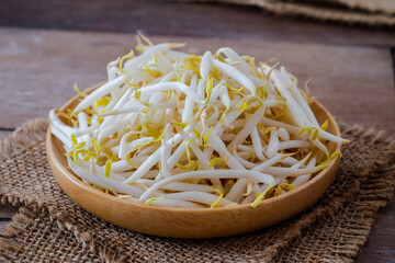 Bean sprouts on wooden plate