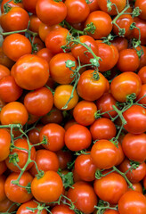 TOMATOES CLOSEUP IN A MARKET