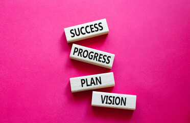 Success Progress Plan Vision symbol. Concept words Success Progress Plan Vision on wooden blocks. Beautiful red background. Business concept. Copy space.