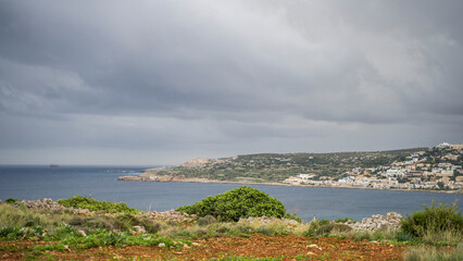 Naklejka premium ships buildings beautiful mediterranean sea malta island sand stones sun cacti