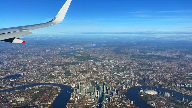 Grear window view in a flight over London City 30fps 4k