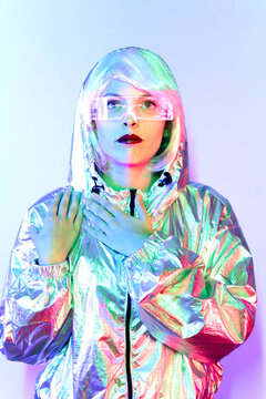 Futuristic woman with transparent goggles and virtual screen