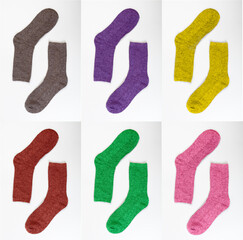 A set of warm wool socks dyed in different colors. Objects on a white background