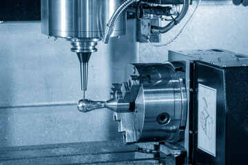 The  4-axis machining center rotary table cutting the sample parts with solid ball end mill tool.