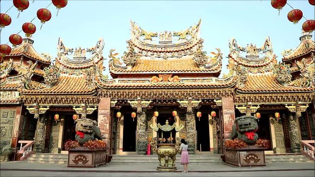 Footage of Sian Lo Tai Tian Kong Chinese Buddhist Temple with a Female Visitor Approaching Shrine's Doorway