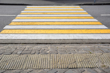 yellow and white lines of crossing isolated, close-up