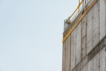 Corner or side of new apartment building construction site in development