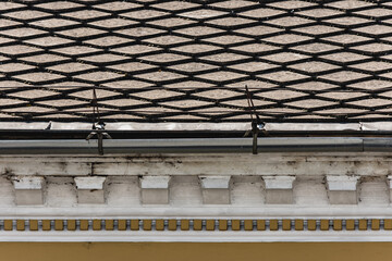 Close up to a house roof tiles or shingle. Construction or real estate backdrop