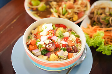 Crisp Catfish Flake Salad is generally offered with Spicy salad sauce which is poured on top of the Crisp Catfish Flake to offer, Thai Traditional Food.
