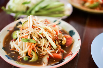 Thai green papaya salad, which is also known as Som Tam is one of the most commonly available and most popularly consumed dishes in all of Thailand.