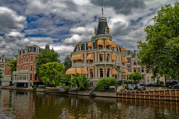 Amsterdam, the Netherlands - view of the old town from the water canal
