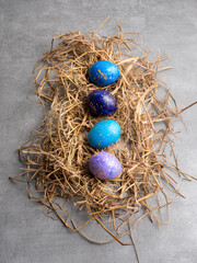 Fototapeta na wymiar easter eggs in a straw nest. Easter festival