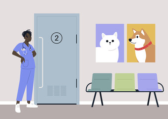 Fototapeta premium A young male African veterinary doctor waiting for visitors in the lobby, domestic animals health care