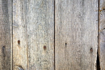 Textura de una puerta de madera desgastada por el tiempo