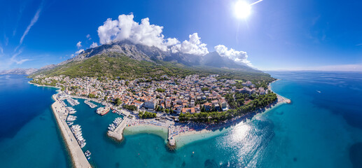 Beautiful Punta Rata beach in Brela, Croatia, aerial view. Adriatic Sea with amazing turquoise...