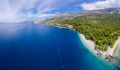 Fototapeta na wymiar Beautiful beach near Brela town, Dalmatia, Croatia.Makarska riviera, famous landmark and travel touristic destination in Europe