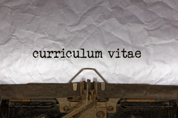 text message - curriculum vitae.
Written with a vintage typewriter. Antique technology for writers and story writers