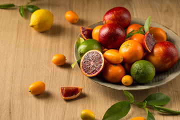 A variety of tropical fruits on a ceramic plate