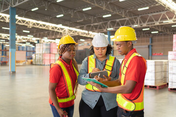 Teamwork of black workers and fat woman working in large warehouse retail store industry. Rack of...