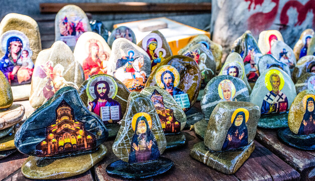 Religious souvenirs made of stone with painted saints for sale, Tbilisi, Georgia, Europe