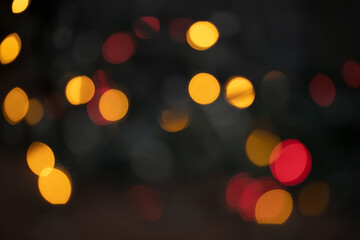 Fototapeta premium Christmas background. Blurry multi-colored lights. Kaleidoscope. Christmas Night Light