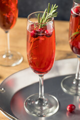 Boozy Refreshing Poinsettia Cranberry Champagne Cocktail