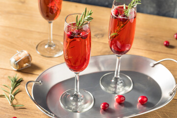 Boozy Refreshing Poinsettia Cranberry Champagne Cocktail