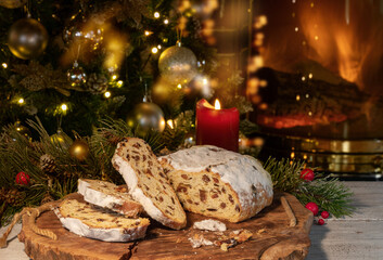 christmas german cake stollen in christmas tree and fireplace