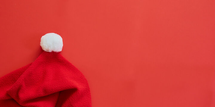 Santa Claus Hat On Red Wallpaper
