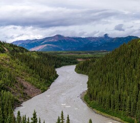 Scenic shot of White River at the Alaska Range in Alaska, USA under a cloudy sky