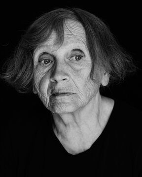 Portrait Of Senior Caucasian Woman On Black Background