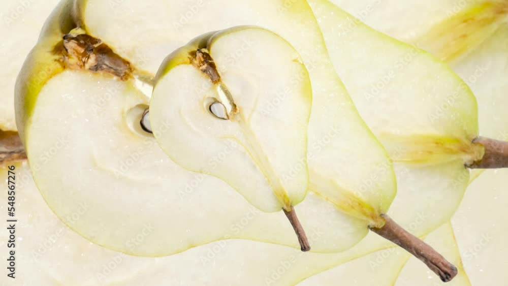 Poster pear slices with stem seamless loop zooming background. vegetables in seamless loop animation. endle