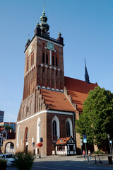 Churches and town halls in the center of Gdansk during the day.