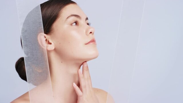 Fabric, beauty and woman in studio for skincare, wellness and grooming against calm, lavender and mockup background. Portrait, face and girl model with silk after facial, morning routine and cosmetic