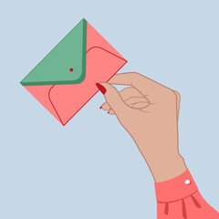The girl is holding an envelope. Delivery of letters. Mail.Hands holding a letter.  Vector illustration in a flat style.