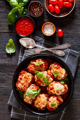 tasty chicken rollatini in tomato sauce, top view