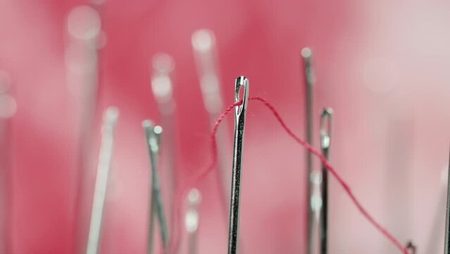 Red thread and needle