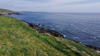 Beautiful views along the route of the Wild Atlantic Way. The green shores of Ireland. Seascape. Drone point of view.