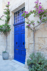 Fototapeta na wymiar Malta Characteristic colorful door, little blue old door