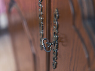 close-up of key of a vintage wardrobe