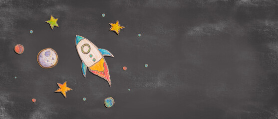 Space exploration theme with rocket and star drawings