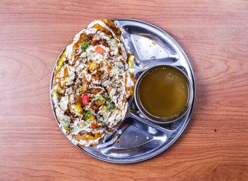 meethi puri or chotpoti served in dish isolated on table top view of indian and pakistani food