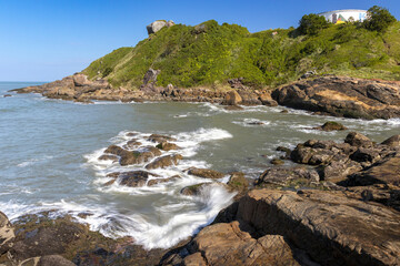 Fototapeta na wymiar Imagens da praia no por do sol litoral paulista