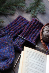 wool sock knitting on wooden background